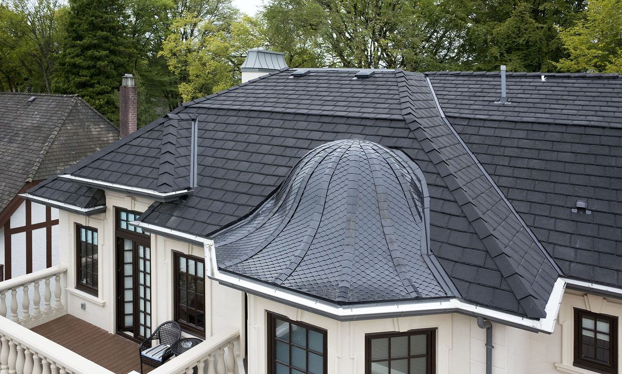 Euroshield Rundle Slate recycled rubber roof on a home with a metal dome