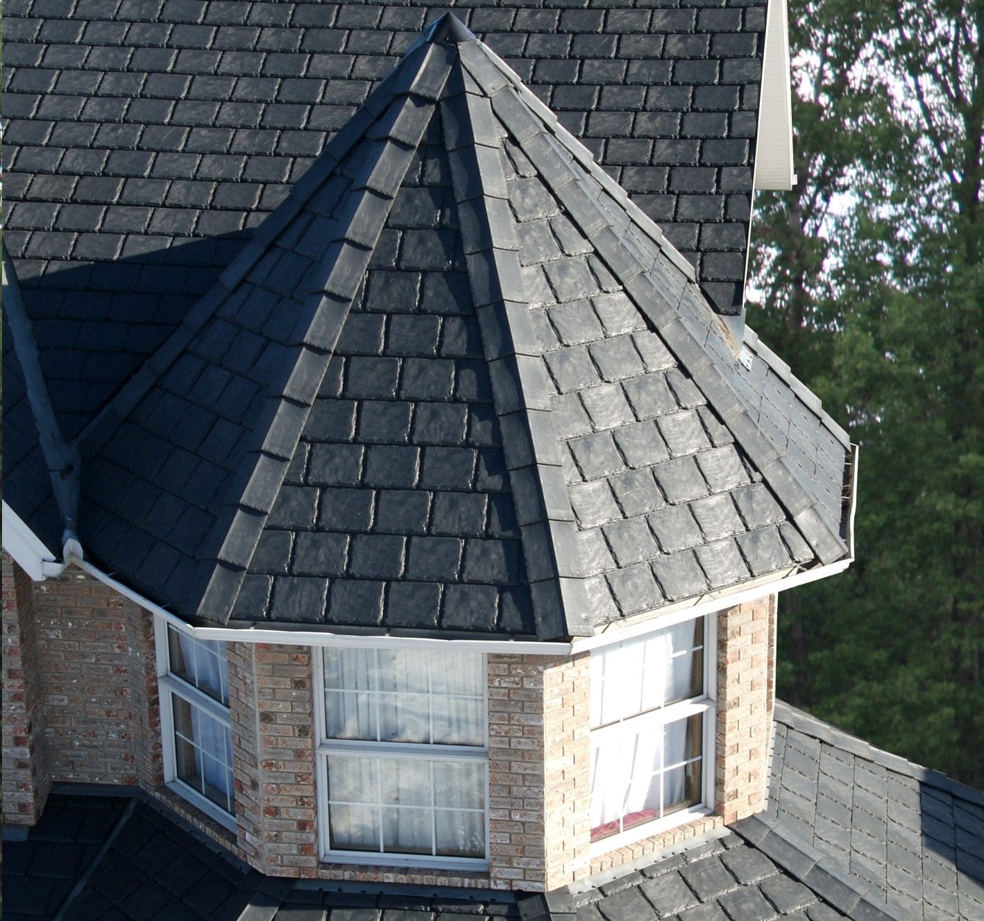 Euroshield Rundle Slate recycled rubber roof on a turret, close-up