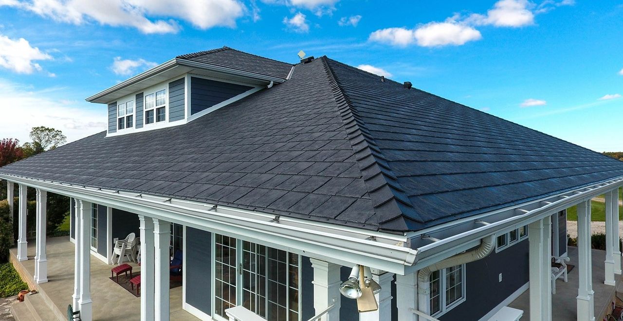 Euroshield Vermont Slate HP recycled rubber roof on a home with a covered front porch