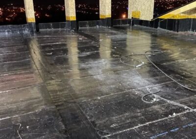 Flat roofing project by Iron Shield Roofing