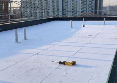 Flat roofing project by Iron Shield Roofing