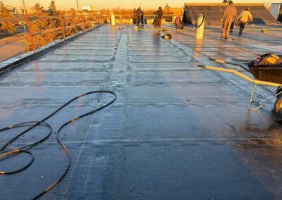Flat roofing project by Iron Shield Roofing