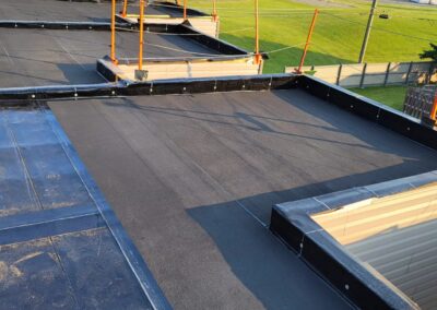 Flat roofing project by Iron Shield Roofing