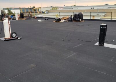 Flat roofing project by Iron Shield Roofing