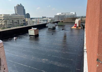 Flat roofing project by Iron Shield Roofing