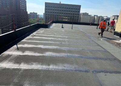 Flat roofing project by Iron Shield Roofing