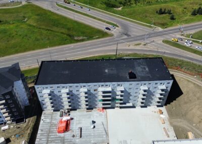 Flat roofing project by Iron Shield Roofing