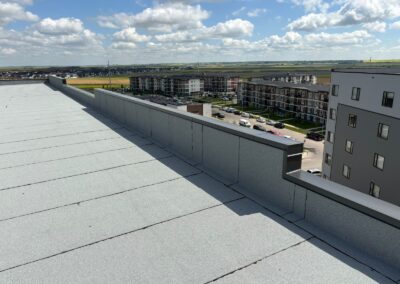 Flat roofing project by Iron Shield Roofing