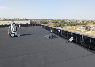 Flat roofing project by Iron Shield Roofing