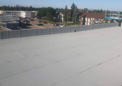 Flat roofing project by Iron Shield Roofing