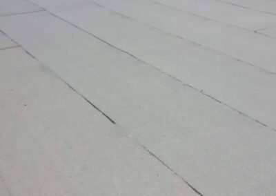 Flat roofing project by Iron Shield Roofing