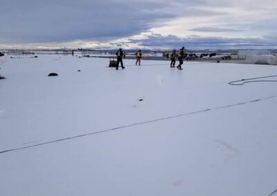 Flat roofing project by Iron Shield Roofing