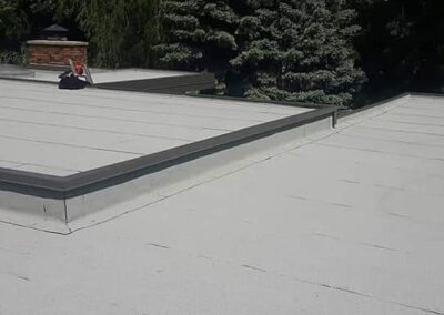 Flat roofing project by Iron Shield Roofing