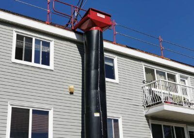 Flat roofing project by Iron Shield Roofing