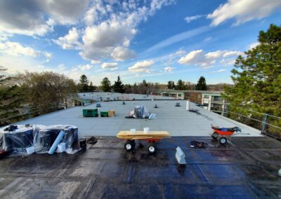 Flat roofing project by Iron Shield Roofing