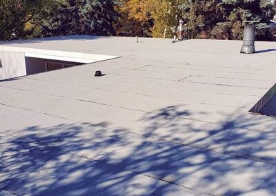 Flat roofing project by Iron Shield Roofing