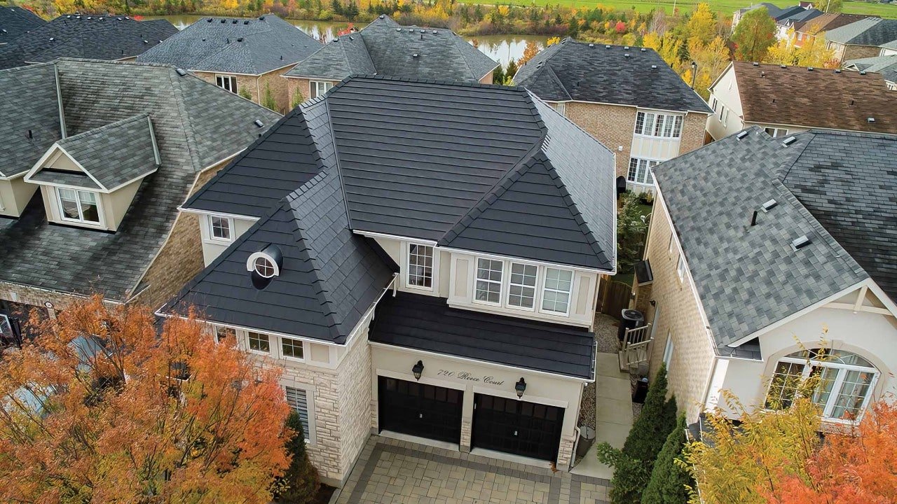 Vicwest True Nature North Ridge Slate steel roof on a home in autumn, aerial view