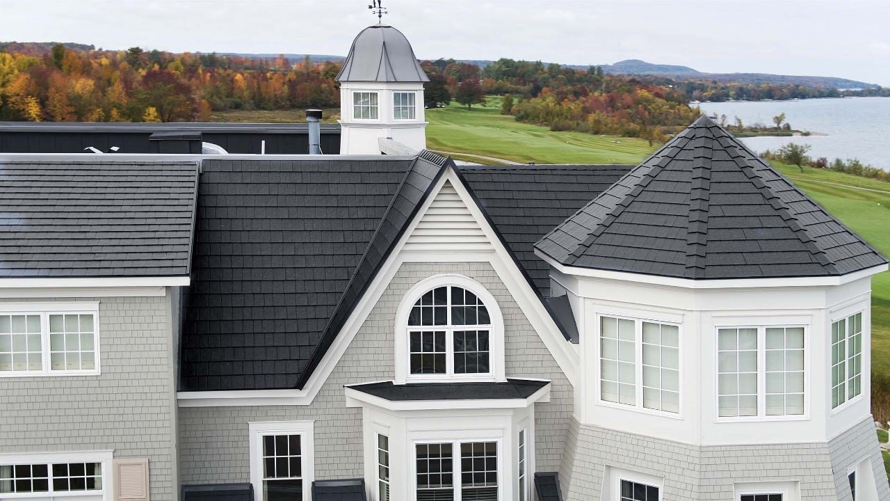 Vicwest True Nature North Ridge Slate steel roof on a home with a turret
